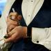 A Saline High School student writes a number on his hand for coat check during prom at EMU on Saturday, May 4. Daniel Brenner I AnnArbor.com